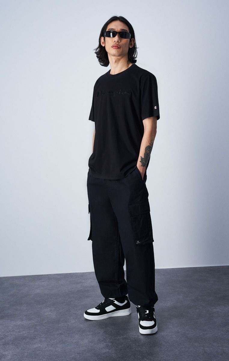 CHAMPION CREWNECK T-SHIRT เสื้อยืดทีเชิ๊ต ผู้ชาย 219870-KK001 Black - 1 Supersports Thailand