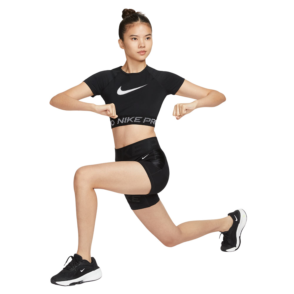NIKE Pro Cropped Graphic เสื้อออกกำลังกายผู้หญิง