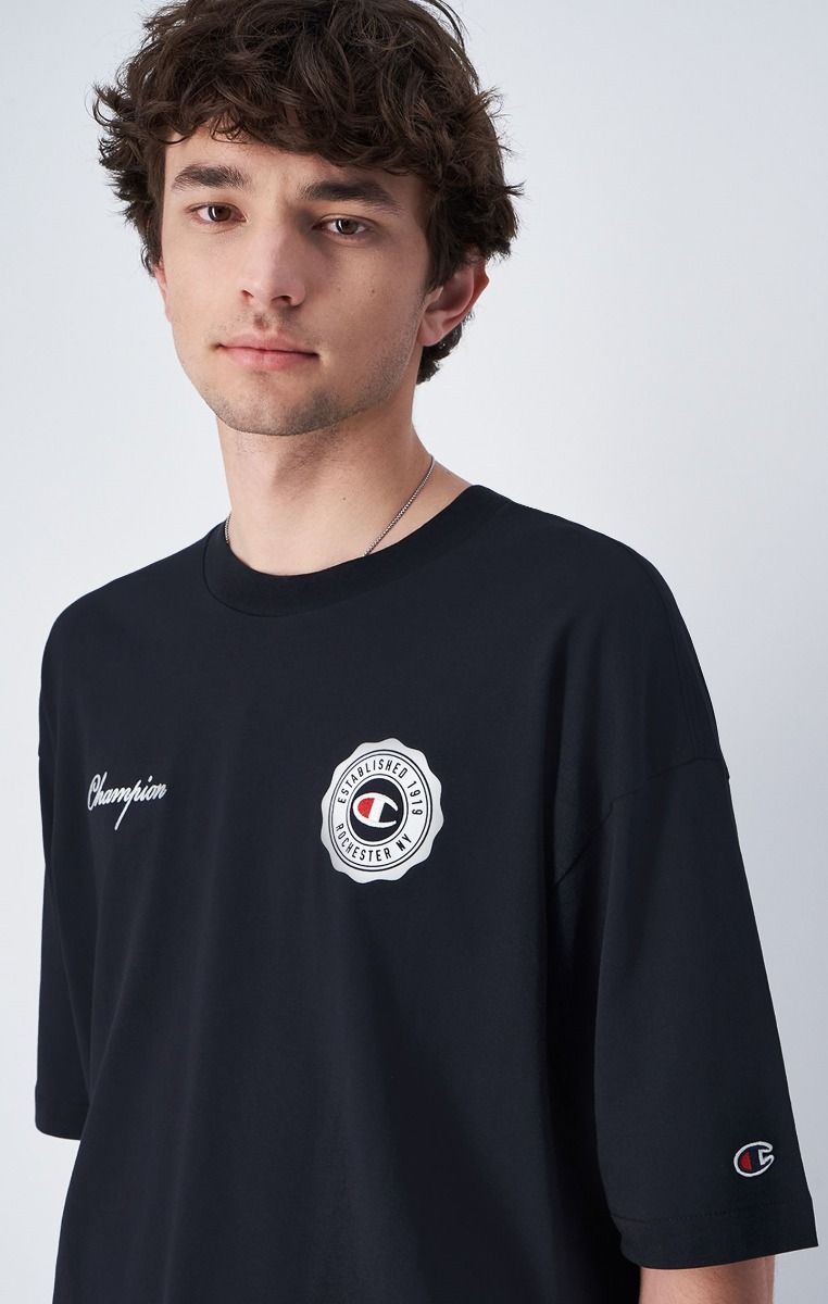 CHAMPION CREWNECK T-SHIRT เสื้อยืดทีเชิ๊ต ผู้ชาย 219855-KK001 Black - 1 Supersports Thailand