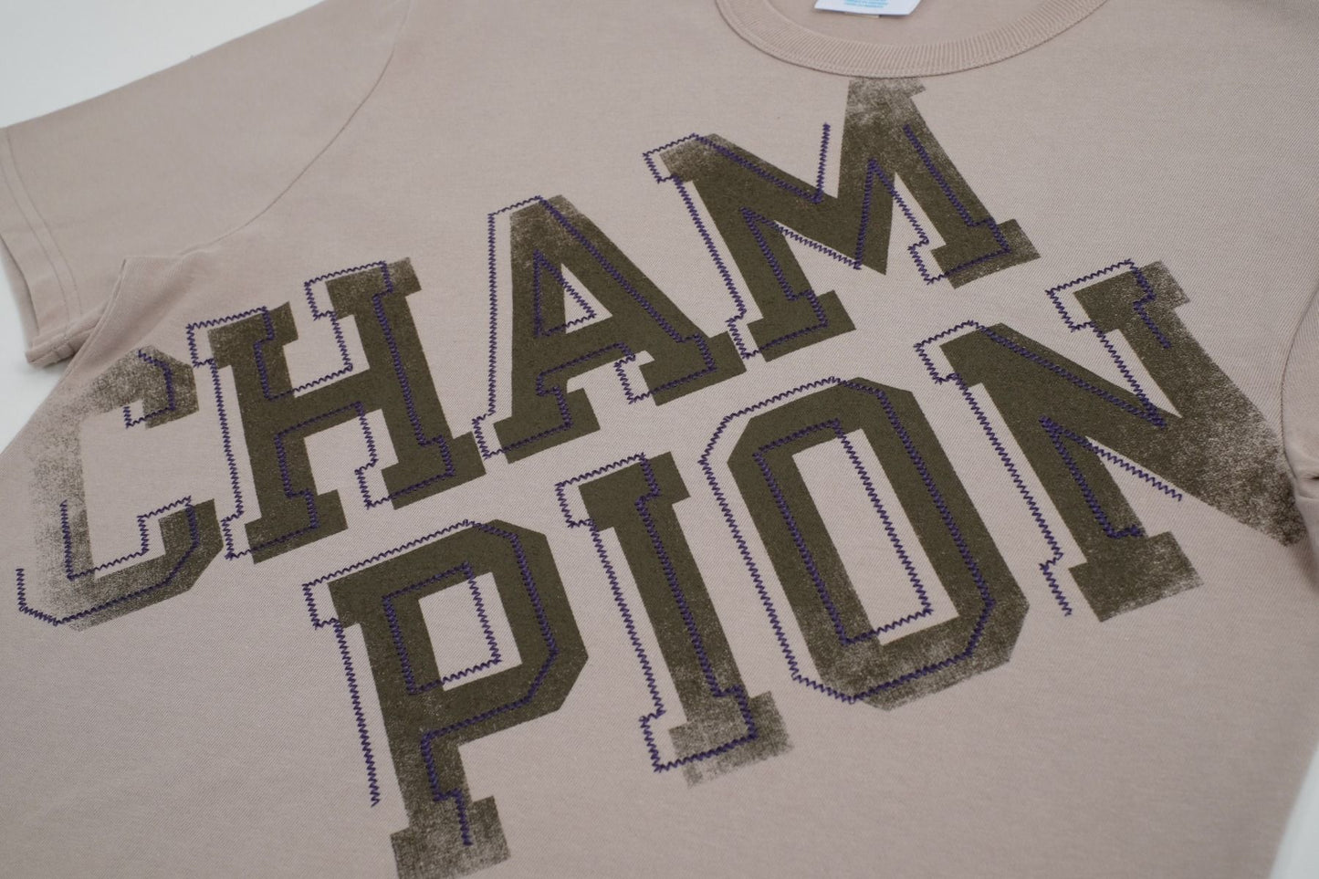 CHAMPION RW HERITAGE S/S GRAPHIC TEE เสื้อยืดทีเชิ๊ต ผู้ชาย GT19 586EXB-WXV Brown - 1 Supersports Thailand