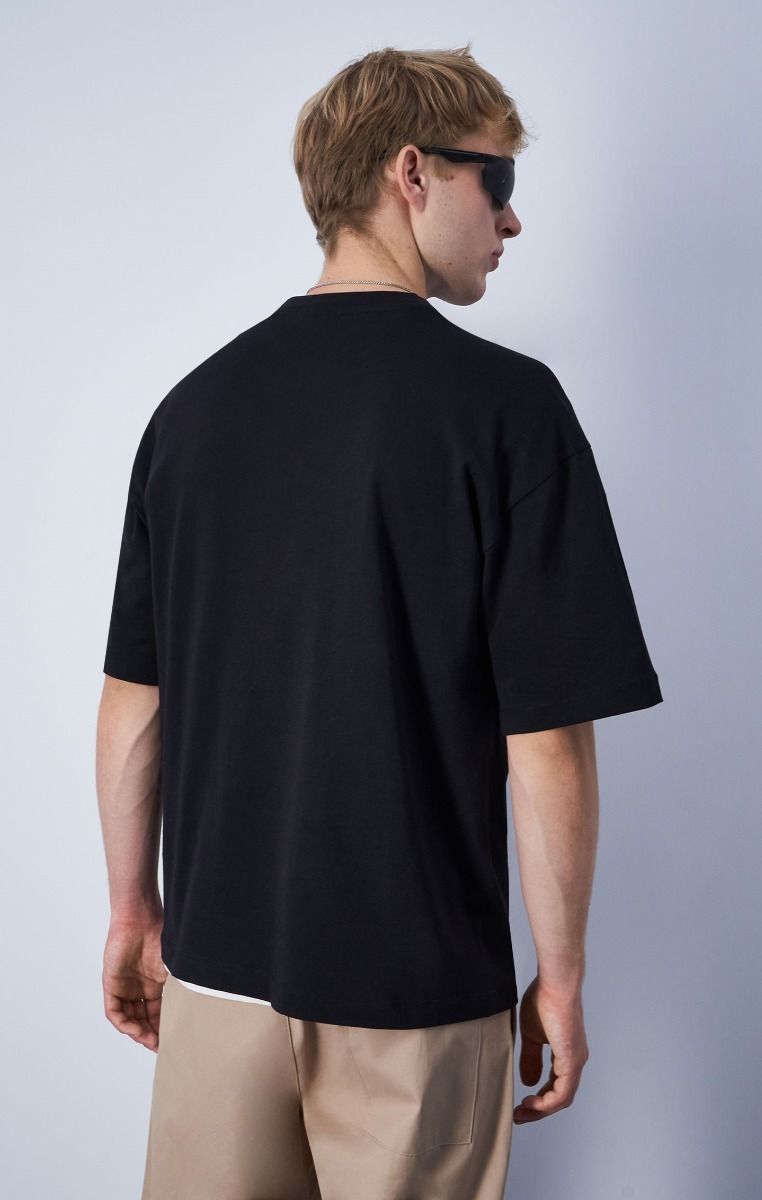 CHAMPION CREWNECK T-SHIRT เสื้อยืดทีเชิ๊ต ผู้ชาย 219856-KK002 Black - 1