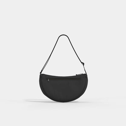678de09d3aa13c4024ca215a_small-moon-bag-absolute-black-back-37eaf602-6c18-4ccf-b0e8-6213946633c5-1800x1800_1784611023173.jpg