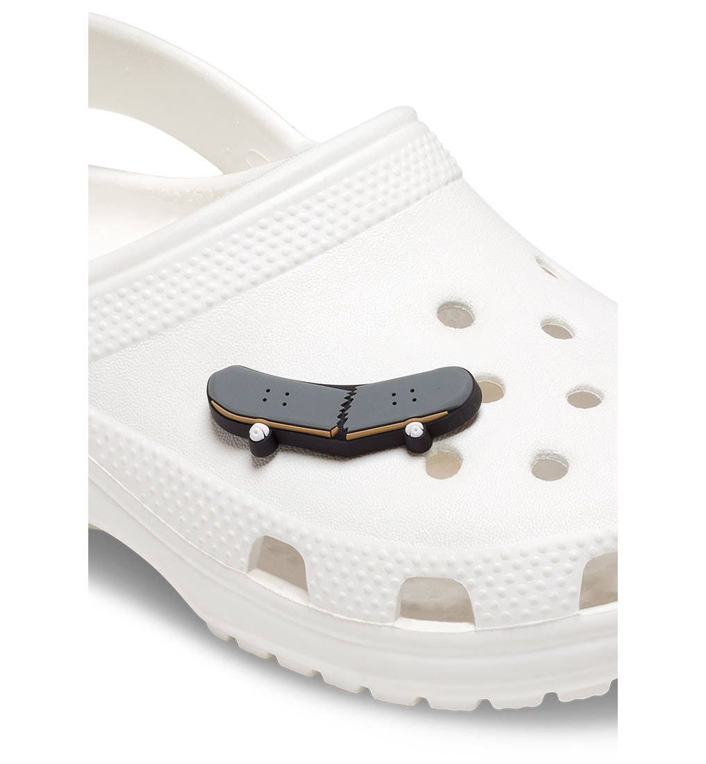 40% OFF on CROCS Jibbitz Broken Skateboard Shoes Charm | SUPERSPORTS