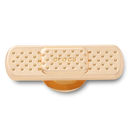 CROCS Jibbitz Golden Bandage Shoes Charm - Supersports Thailand