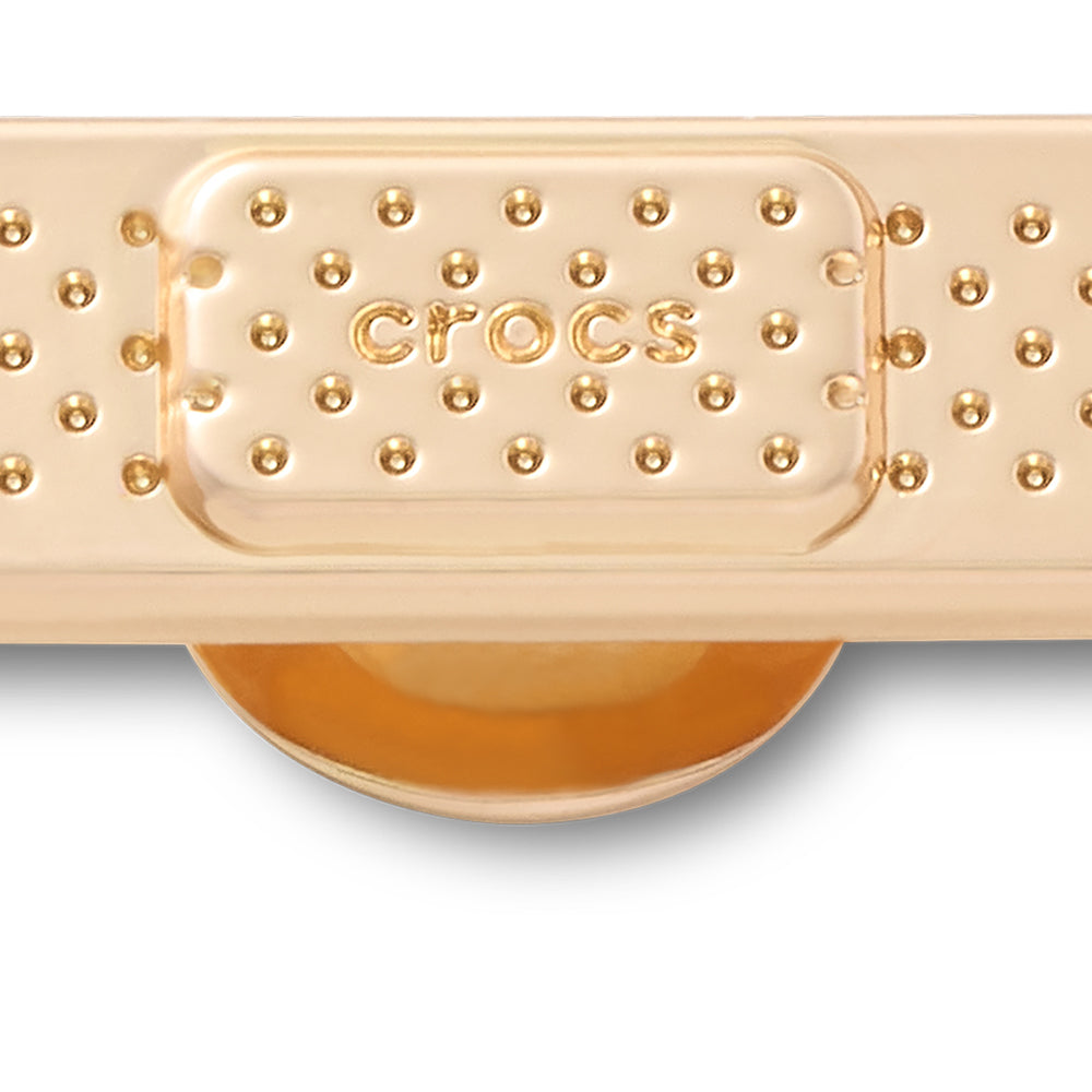 CROCS Jibbitz Golden Bandage Shoes Charm - Supersports Thailand