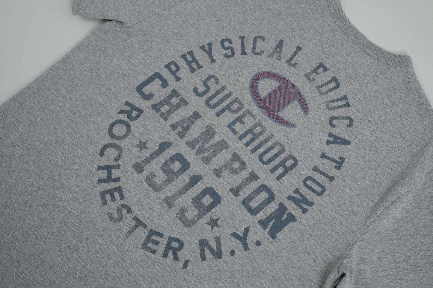 CHAMPION RW HERITAGE S/S GRAPHIC TEE เสื้อยืดทีเชิ๊ต ผู้ชาย GT19 586EWB-1IC Grey - 1 Supersports Thailand
