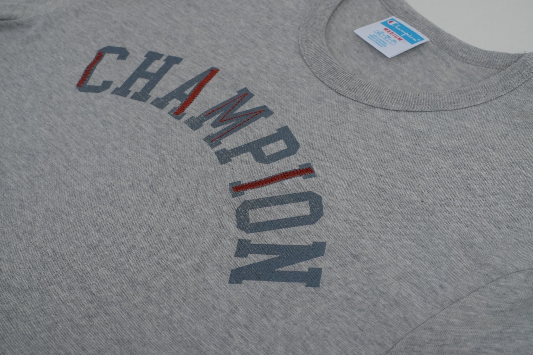 CHAMPION RW HERITAGE S/S GRAPHIC TEE เสื้อยืดทีเชิ๊ต ผู้ชาย GT19 586EWB-1IC Grey - 1