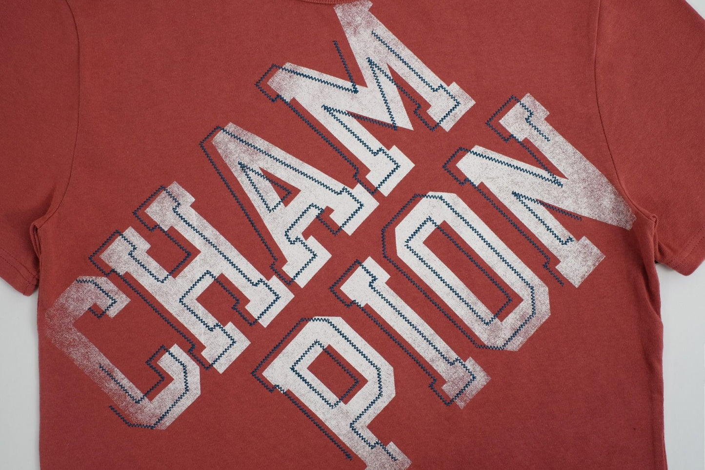 CHAMPION RW HERITAGE S/S GRAPHIC TEE เสื้อยืดทีเชิ๊ต ผู้ชาย GT19 586EXB-A1DF Red - 1 Supersports Thailand