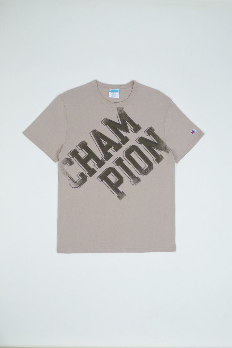 CHAMPION RW HERITAGE S/S GRAPHIC TEE เสื้อยืดทีเชิ๊ต ผู้ชาย GT19 586EXB-WXV Brown - 1 Supersports Thailand